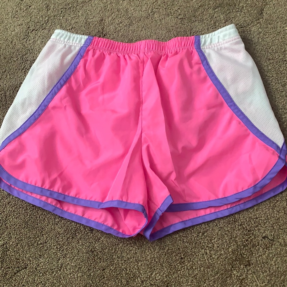 Pink, purple, and white athletic shorts